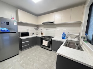 Fridge, microwave, stovetop, electric kettle