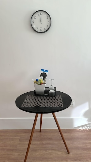 Desk, laptop workspace, blackout drapes, iron/ironing board