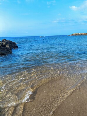 On the beach, white sand
