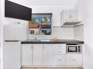 Superior 1 Bedroom Cabin | Private kitchen | Fridge, microwave, toaster