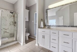 Jetted tub, hair dryer, towels, soap