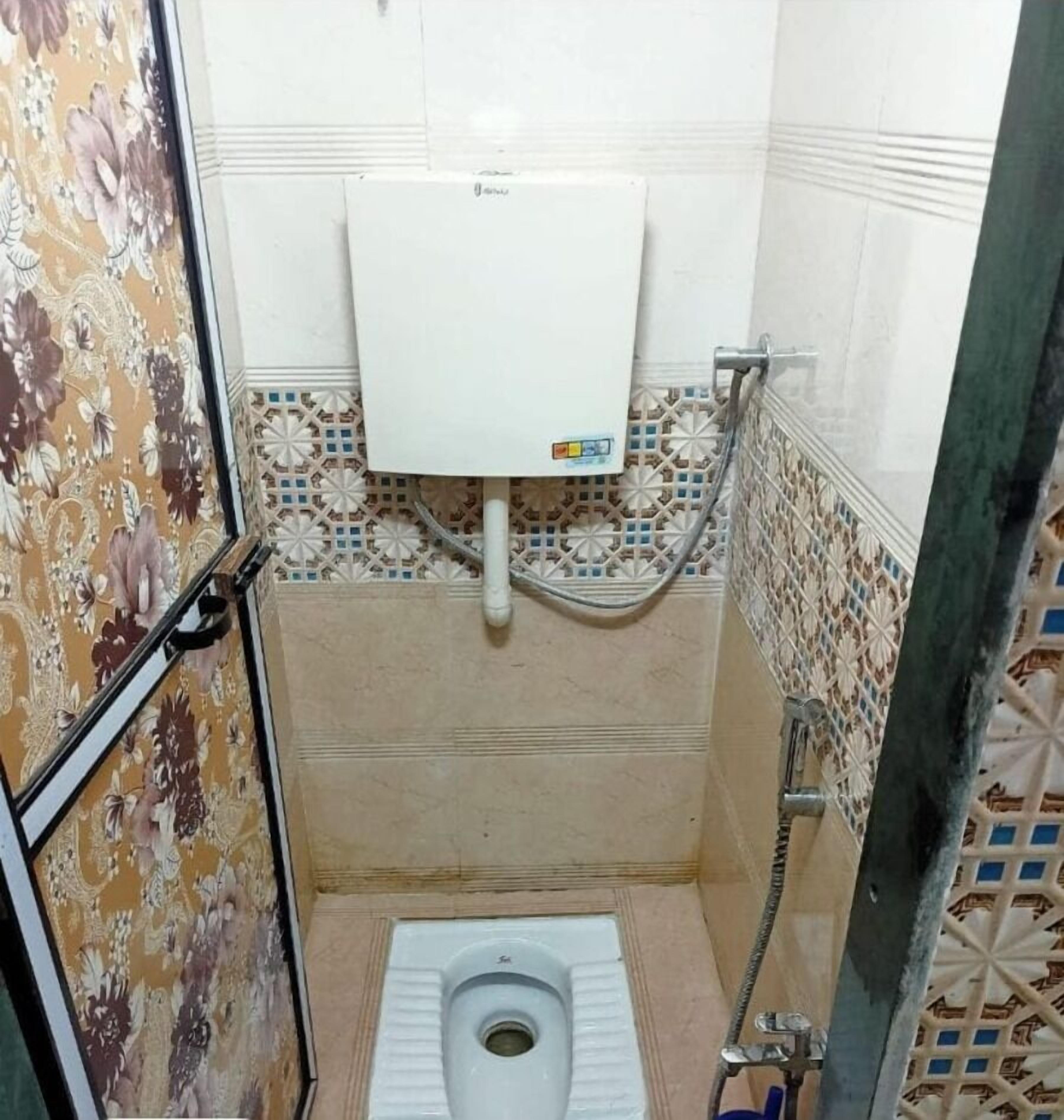 Economy Shared Dormitory | Bathroom | Shower, slippers, towels