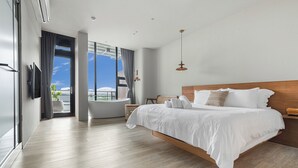 A modern hotel bedroom with a large bed, a view of the city, a bathtub, and a large window. - Ningxialight (Wujie)