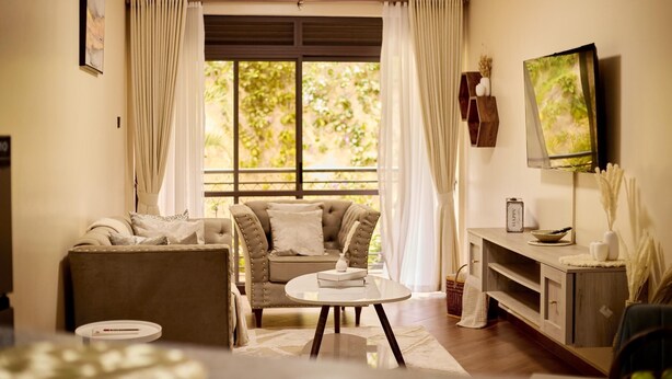 Deluxe Apartment, City View | Living area - Sand Grains Residences 001 (Entebbe)