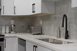 Fridge, microwave, oven, stovetop - St. Albert Luxury New 2BR/2BA Basement • Private Entrance • Pet-Friendly (St. Albert)