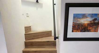 "Two-Story Townhome Newly Renovated One-Bedroom Getaway Awaits Your Stay!"