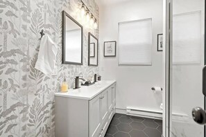 Hair dryer, towels, soap, toilet paper