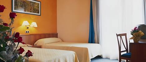 Comfort Twin Room | Premium bedding, down comforters, memory foam beds, desk