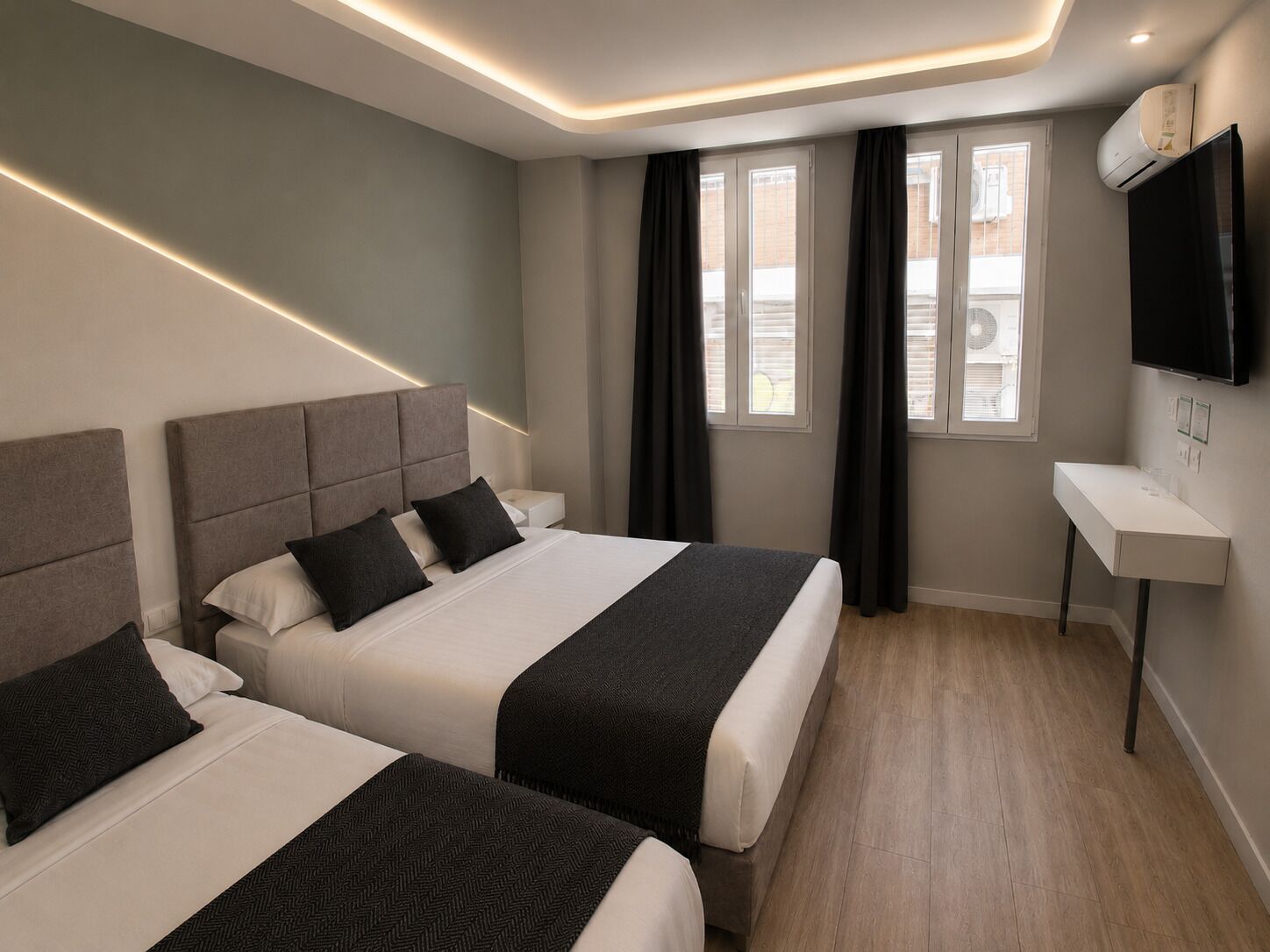Triple Room | Down comforters, memory foam beds, soundproofing, free WiFi