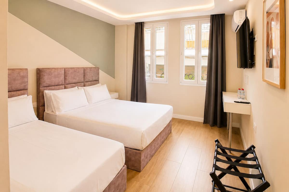 Triple Room | Down comforters, memory foam beds, soundproofing, WiFi (free)