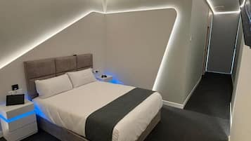 Premium bedding, down comforters, memory foam beds, minibar