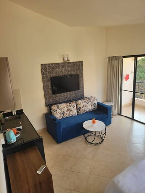 Appartement, 1 chambre, balcon, vue sur le jardin | Aire de séjour