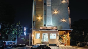 A modern hotel with a prominent sign reading "HOTEL FORTUNE." - Hotel Fortune Elevate (Jaipur)