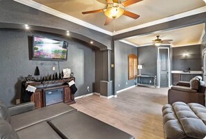 Smart TV, fireplace, books