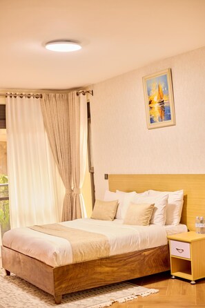 Economy Apartment, Hill View | 2 bedrooms, in-room safe, desk, laptop workspace - Sand Grains Residences 006 (Entebbe)