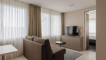 Comfort Double Room | Living area | 32-inch LED TV with cable channels