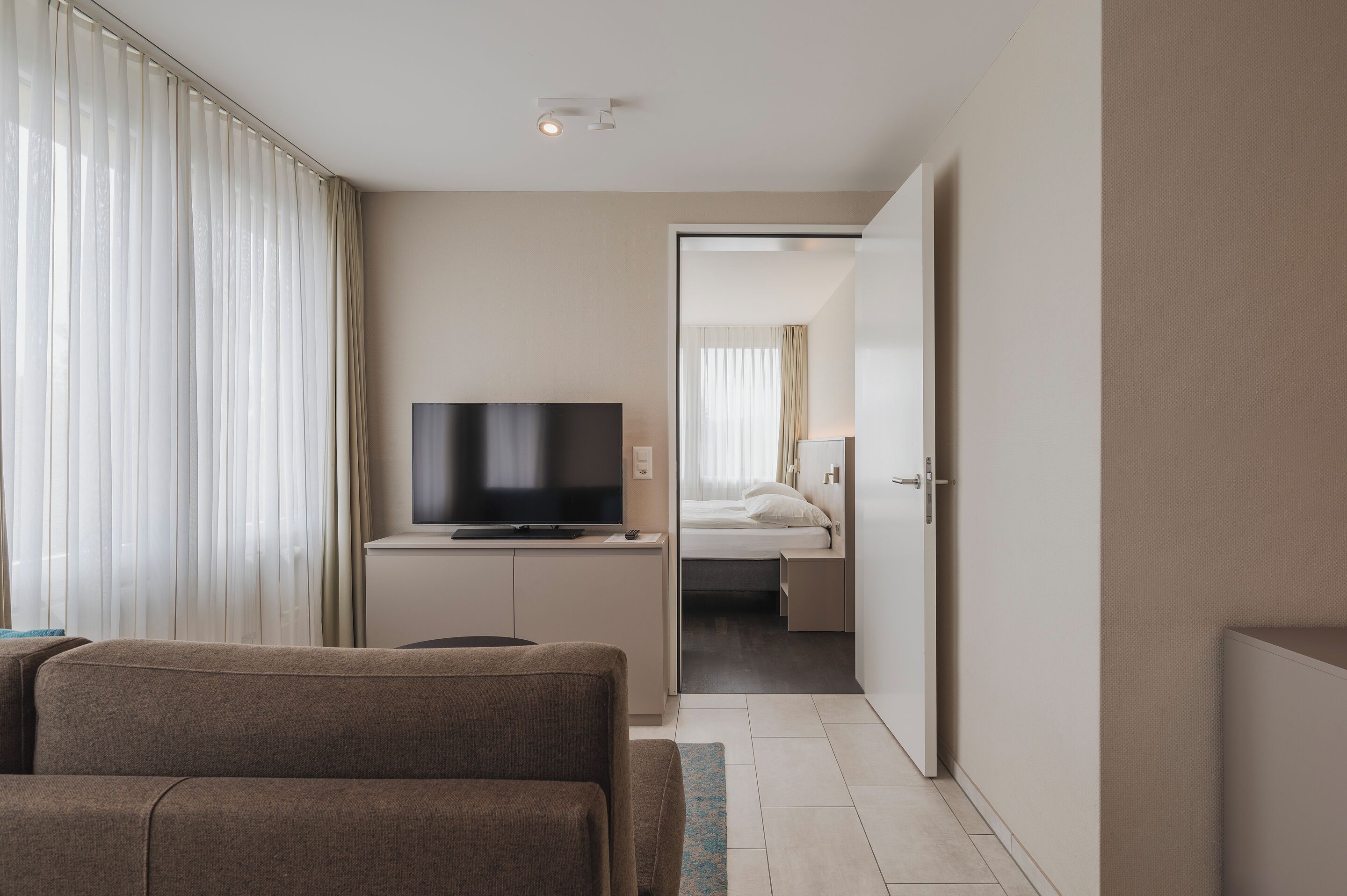 Superior Double Room | Living area | 32-inch LED TV with cable channels