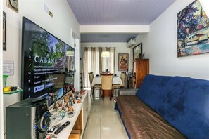 Suite Deluxe, vue piscine | Salle de séjour