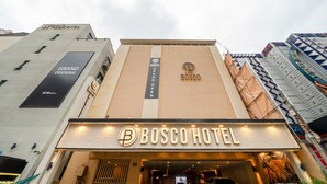 The exterior of the Bosco Hotel with a prominent 'Grand Opening' banner. - Hotel Bosco Incheon (Incheon)