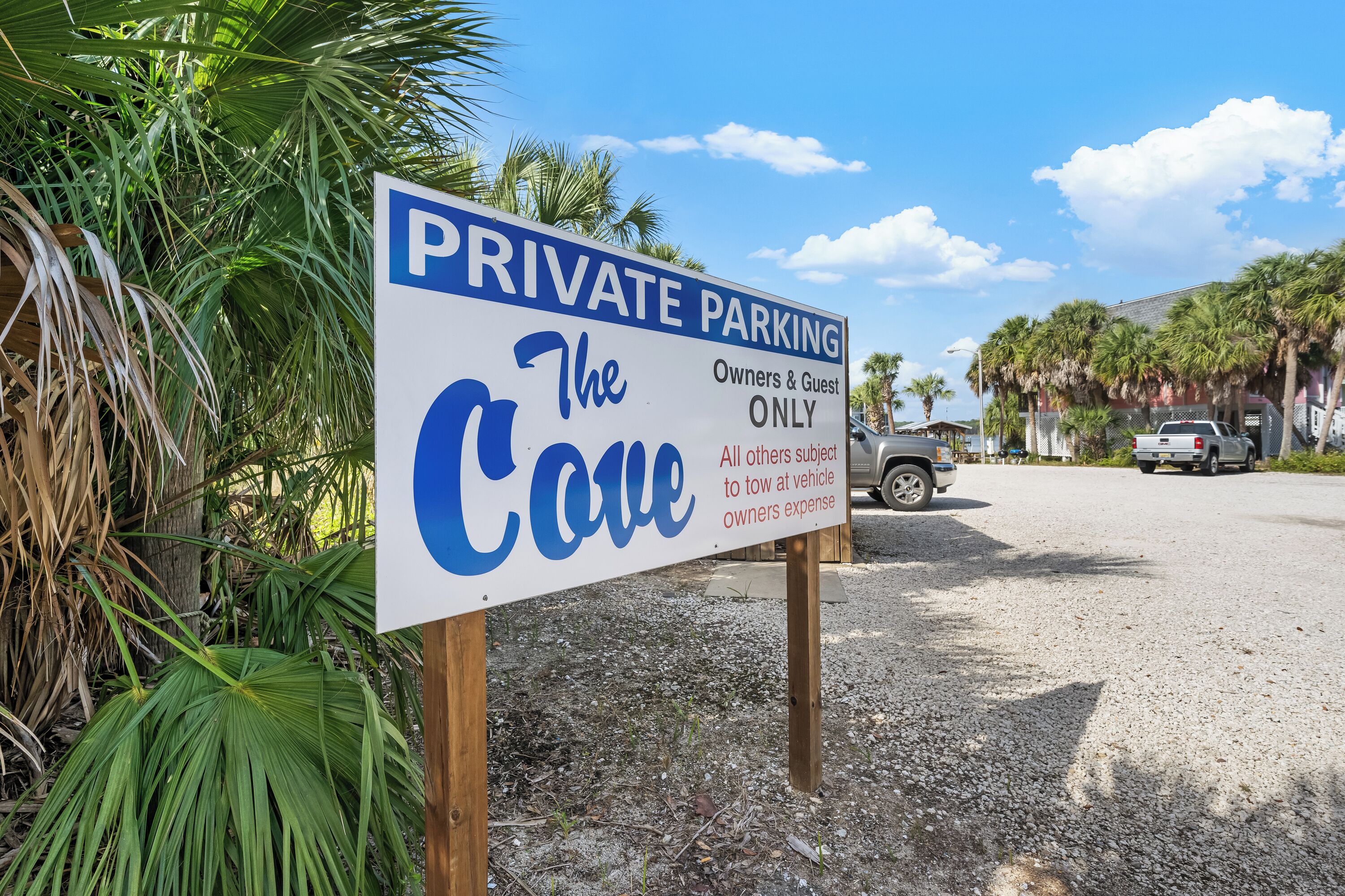 A sign for private parking at The Cove, indicating it's for owners and guests only.