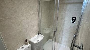 Shower, free toiletries, hair dryer, towels
