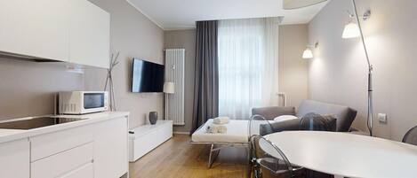 Tabla de planchar con plancha, wifi gratis, ropa de cama