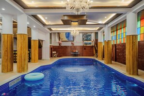 Indoor pool, open 7:00 AM to 7:00 PM, pool loungers - The Kurki Heritage (Jaipur)