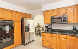 Fridge, microwave, oven, stovetop - Large Family Home with Game Room (Page)
