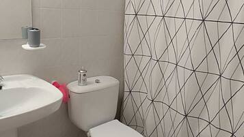 Hair dryer, bidet, towels, soap