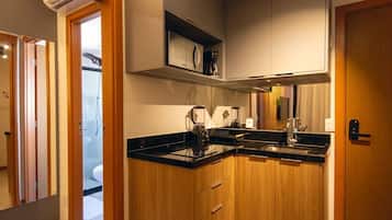 Triple Room | Private kitchen | Mini-fridge, microwave, stovetop, coffee/tea maker