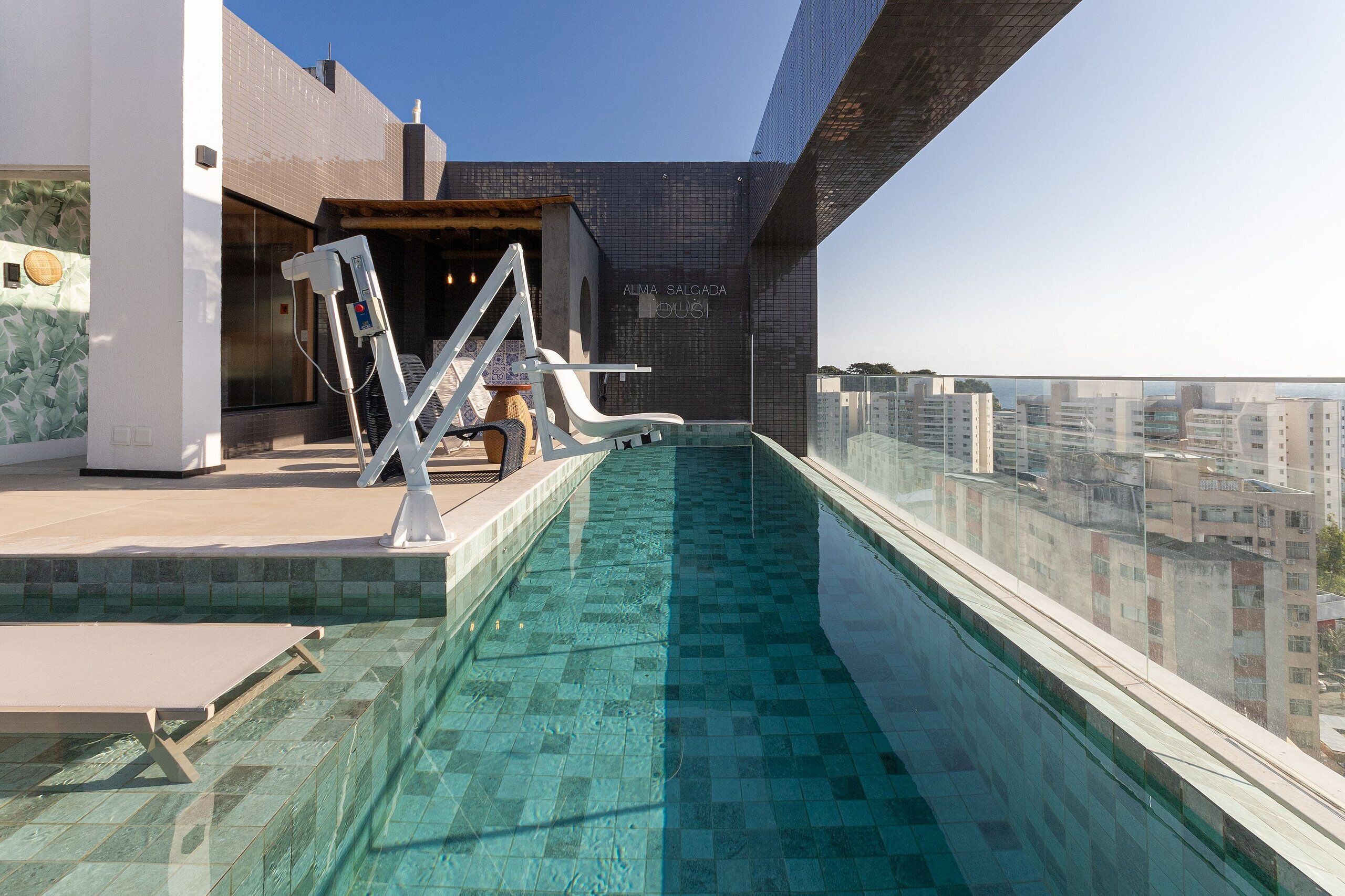 Indoor pool, open 9:00 AM to 9:00 PM, pool umbrellas, pool loungers