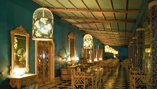 A room with a checkered floor, ornate chandeliers, and mirrored walls. - Raj Niwas Palace (Dhaulpur)