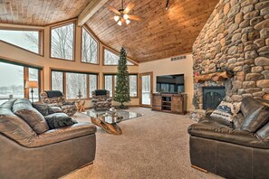 Smart TV, fireplace, table football, books