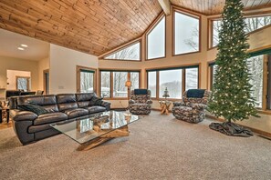 Smart TV, fireplace, table football, books