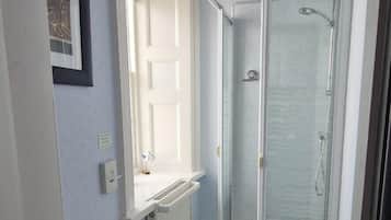 Deluxe Double Room | Bathroom | Hair dryer, bathrobes, towels, soap