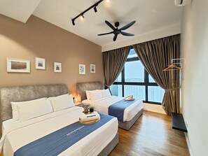 Apartment, 2 Bedrooms | 3 bedrooms, desk, laptop workspace, iron/ironing board