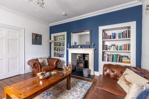 Smart TV, fireplace, DVD player, books