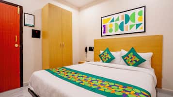 Economy Double Room | Desk, blackout curtains, iron/ironing board