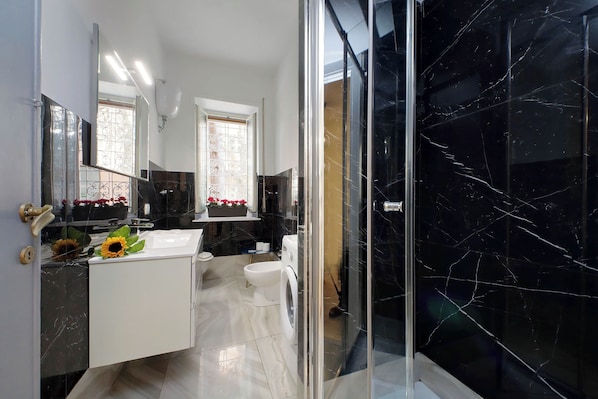 Departamento Confort, vista al jardín | Baño