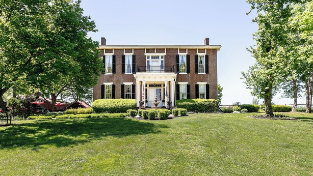 A two-story brick building with a central entrance, surrounded by well-maintained lawns and trees. - 7 Private Rooms, Country Setting Bourbon Trail, patio/firepit. Breakfast inc. (Springfield)