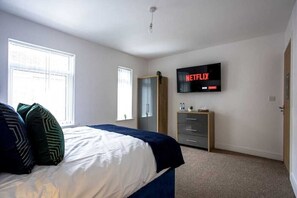 4 bedrooms, iron/ironing board, travel cot, WiFi