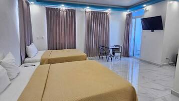 Family Twin Room, Balcony, Partial Sea View | Free WiFi