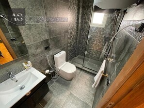 Shower, towels, soap, shampoo