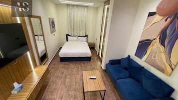 Suíte standard | Escrivaninha, ferros/tábuas de passar roupa, Wi-Fi de cortesia