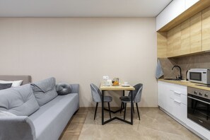 Classic Apartment, Park View | Living area | TV - Apartments in the complex Vogue (Minsk)