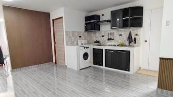 Microwave, electric kettle, toaster, cookware/dishes/utensils