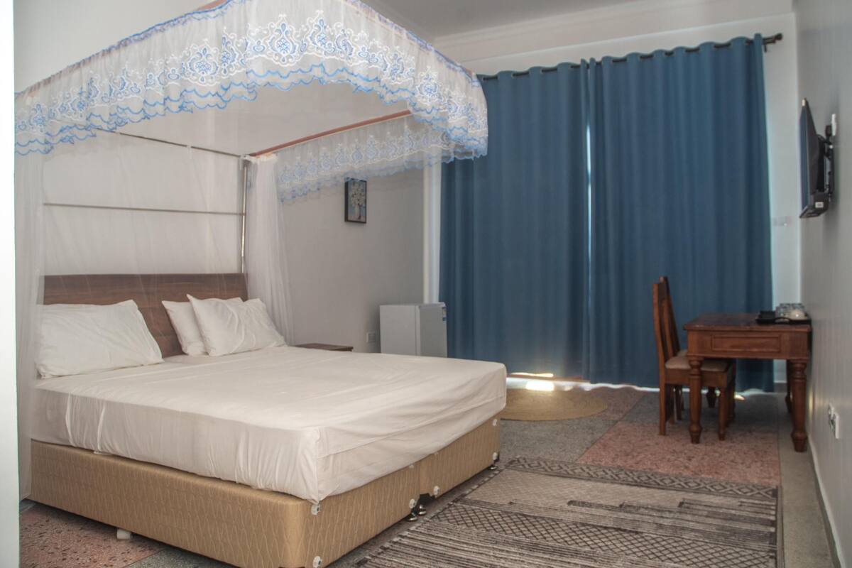 Deluxe Double Room, Balcony, Sea View | In-room safe, desk, laptop workspace, blackout curtains