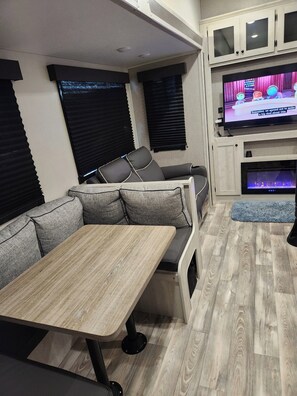 Living area - Cozy 2-bedroom RV in charming Kemah with WiFi, AC (Kemah)