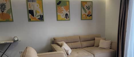 Apartment, Balcony | Living area | 42-inch Smart TV with satellite channels