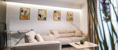 Apartment, Balcony | Living area | 42-inch Smart TV with satellite channels